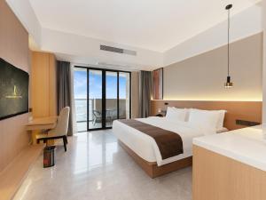 Postel nebo postele na pokoji v ubytování JD POLMAN Hotel + 37 fotografií
