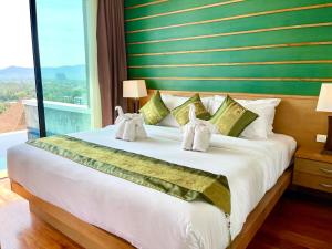 Postel nebo postele na pokoji v ubytování 206 Ao Nang, Private Sea View Pool Villa