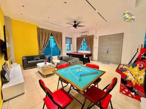 a living room with a ping pong table at BukitKatil16pax-snooker｜arcade in Malacca