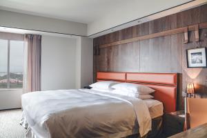 Postel nebo postele na pokoji v ubytování Sheraton Taitung Hotel