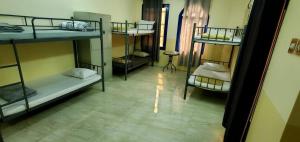 Postel nebo postele na pokoji v ubytování Viva Hostel Group Nizwa