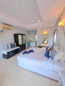 Kuchyň nebo kuchyňský kout v ubytování Prathana Garden Beach Resort
