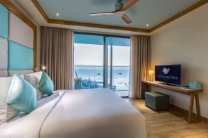 TV a/nebo společenská místnost v ubytování Fusion Suites Vung Tau