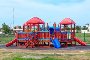 a playground with a slide and slidesktop at Casa Laguna , Lagoon House in Veracruz