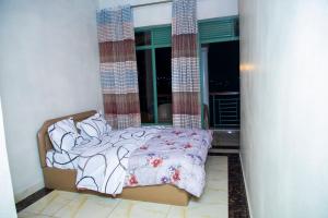Ένα ή περισσότερα κρεβάτια σε δωμάτιο στο COZA LEEDS HOMES