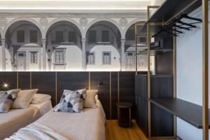 Postel nebo postele na pokoji v ubytování Hotel Mia Cara & Spa