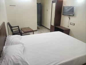 Voodi või voodid majutusasutuse Hotel Krishna toas