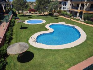 Zdjęcie z galerii obiektu Costa Esuri Ayamonte Las Encinas Luxury 3-bedroom apartment - huge garden w mieście Ayamonte