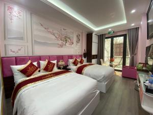 Кровать или кровати в номере HD Villa hotel Dương Nội - by Bay Luxury +3 фотографии