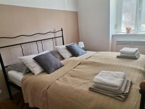 Llit o llits en una habitació de Casa di nonna Pina, kuca u blizini Arene