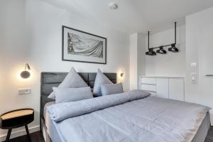 Ein Bett oder Betten in einem Zimmer der Unterkunft Haus Noena