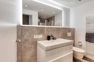 Ein Badezimmer in der Unterkunft Haus Noena