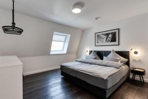 Ein Bett oder Betten in einem Zimmer der Unterkunft Haus Noena