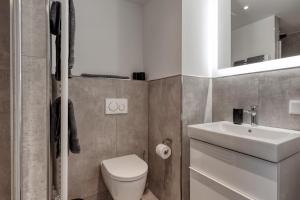 Ein Badezimmer in der Unterkunft Haus Noena