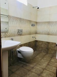 A bathroom at Naveed Residency