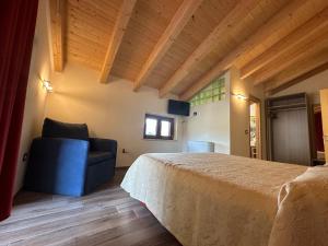 Postel nebo postele na pokoji v ubytování LorichiAmo B&b