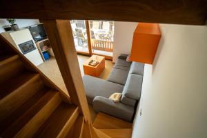 an overhead view of a living room with a couch at KAJZA KOLOVRAT in Mozirje