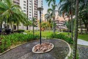 a table with a bowl of food on top of it at Cozy Resort-Feel 3Bedroom-BBQ, Pool, Netflix 10pax in Seri Kembangan