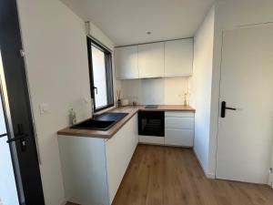 Η κουζίνα ή μικρή κουζίνα στο Maison neuve avec Mezzanine +6 φωτογραφίες