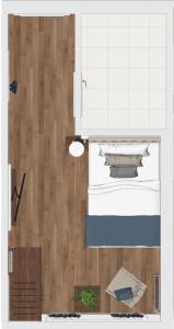 plan piętra pokoju z drewnianą podłogą w obiekcie Hotel Rummeni w mieście Borkum