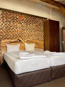 Postel nebo postele na pokoji v ubytování Лондонъ - къща за гости / London - guest house