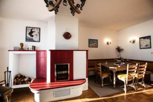Χώρος καθιστικού στο Nockhaus76 - 70s GLAM in den Nockbergen - Almhaus auf 1560 m