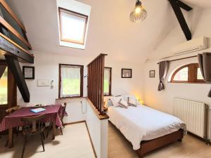 Postel nebo postele na pokoji v ubytování Gîte et Chambres d'hôtes, l'Erable + 37 fotografií