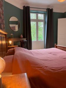 Katil atau katil-katil dalam bilik di Domaine La Rose