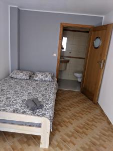 Cama o camas de una habitación en DELFIN Wynajem Pokoi