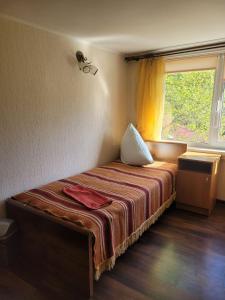 Postel nebo postele na pokoji v ubytování Карпатська Мавка