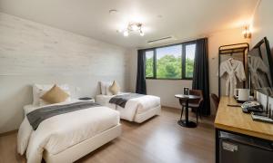CM Park Hotel客房内的一张或多张床位