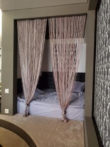 Postel nebo postele na pokoji v ubytování CosHOME - apartament