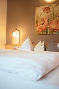 Posteľ alebo postele v izbe v ubytovaní Hotel Wildschütz