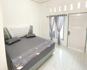 Afbeelding uit fotogalerij van Lansogo Homestay in Painan