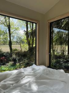 Rúm í herbergi á Tiny House mit Garten in der Lüneburger Heide