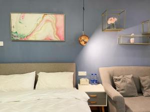 Ένα ή περισσότερα κρεβάτια σε δωμάτιο στο 深圳LaCave公寓