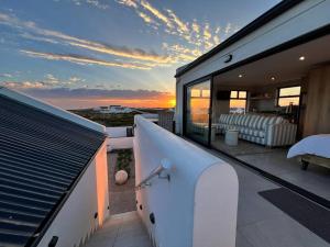 Blick auf den Sonnenuntergang/Sonnenaufgang von der Ferienwohnung aus oder aus der Nähe