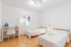 Posteľ alebo postele v izbe v ubytovaní Villa Rakhi