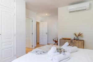 Posteľ alebo postele v izbe v ubytovaní Villa Rakhi + 37 fotografií