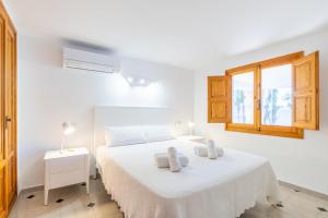 Posteľ alebo postele v izbe v ubytovaní Villa Rakhi
