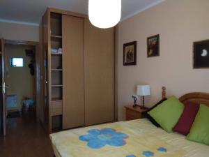 Giường trong phòng chung tại San Isidro EL LLAR 122