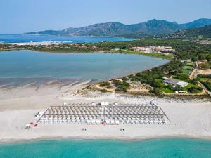 an aerial view of a beach with a resort at Almar Timi Ama Resort & Spa in Villasimius