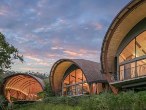 a rendering of a building with curved roofs at Andaz Costa Rica Resort at Peninsula Papagayo – A concept by Hyatt in Culebra