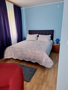Postel nebo postele na pokoji v ubytování Apartments Slavica