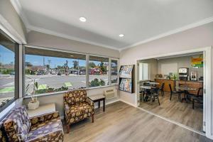 a living room with a view of a street at Quality Inn Santa Cruz Downtown Area in Santa Cruz
