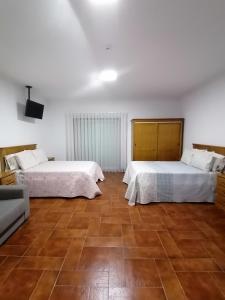 Postel nebo postele na pokoji v ubytování Hostel Encostas Do Douro