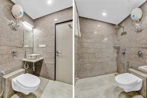 a bathroom with a toilet and a sink at Hotel Park Seven Near Delhi International Airport in New Delhi