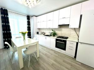 Kuchyňa alebo kuchynka v ubytovaní OSapart Nice apartment in a complex Great Britain