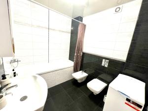 Kúpeľňa v ubytovaní OSapart Nice apartment in a complex Great Britain