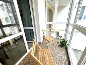 Balkón alebo terasa v ubytovaní OSapart Nice apartment in a complex Great Britain
